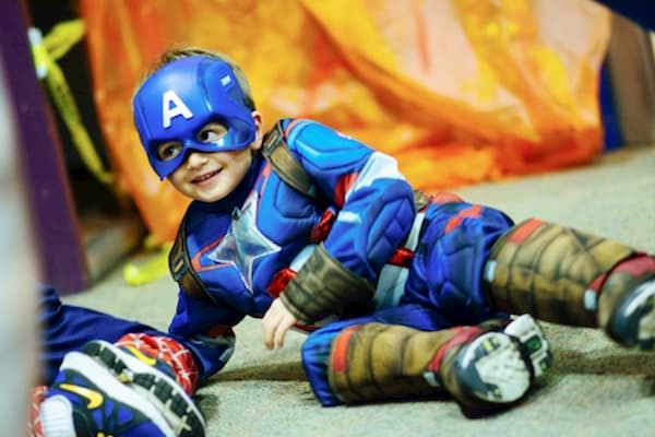 Boy in superhero costume for Halloween 