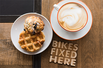 Coffee, muffin, and waffle served at SHIFT Cycler & Coffee Bar 