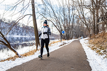 A woman running on the winter route in Eau Claire 