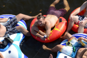 People floating on tubes on the river 