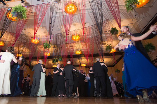 Couples dancing in the grand ballroom at Viennese Ball 