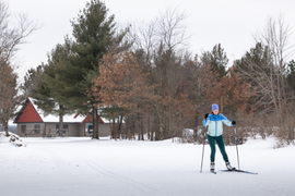 A woman cross country skiing at Tower Ridge Recreation Area 