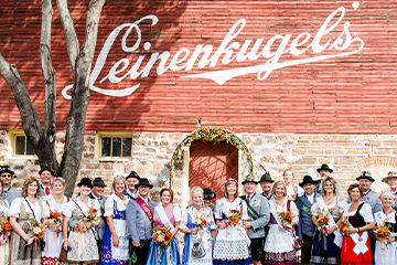 People dressed in traditional German attire at Leinie Lodge for Oktoberfest 