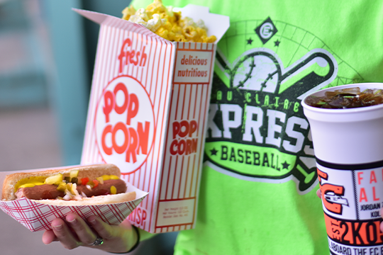 Popcorn, soda, and hot dog served at Eau Claire Express baseball game 
